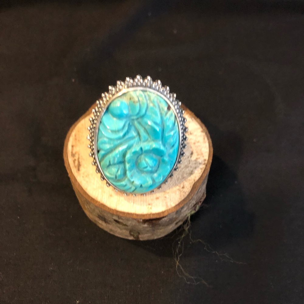 Red and turquoise rings on silver setting